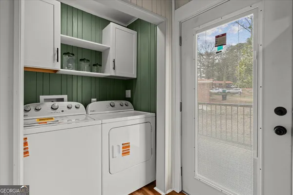 a utility room with dryer and washer