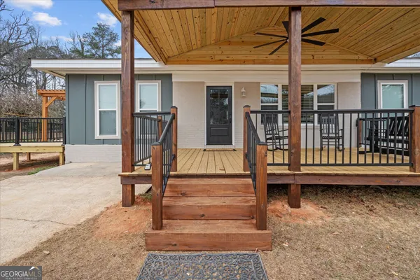a view of house with a outdoor space