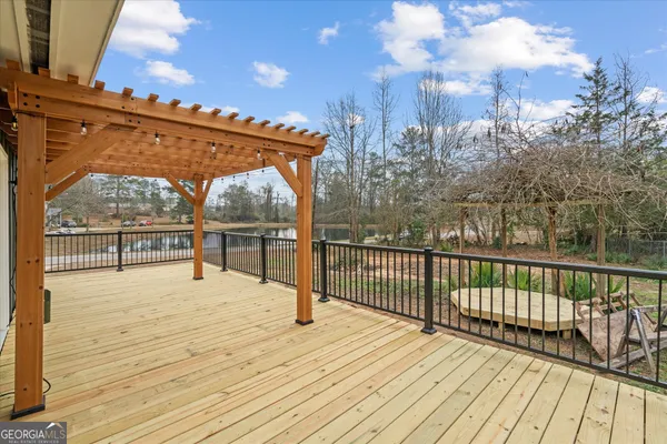 a view of a balcony with wooden floor