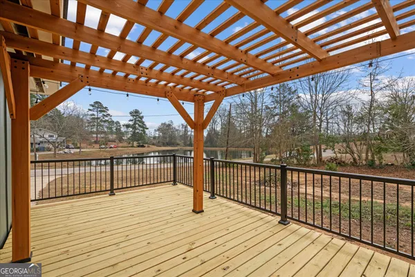 a view of balcony with wooden floor