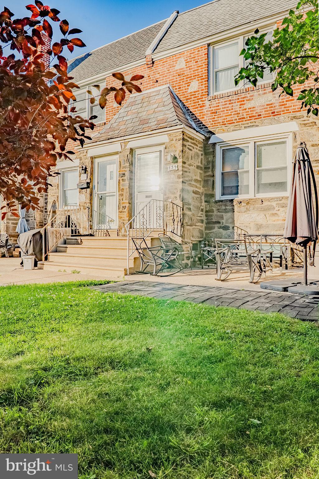 739 Fairfax Road Drexel Hill, PA 19026 - Photo 2 of 18 a front view of a house with garden