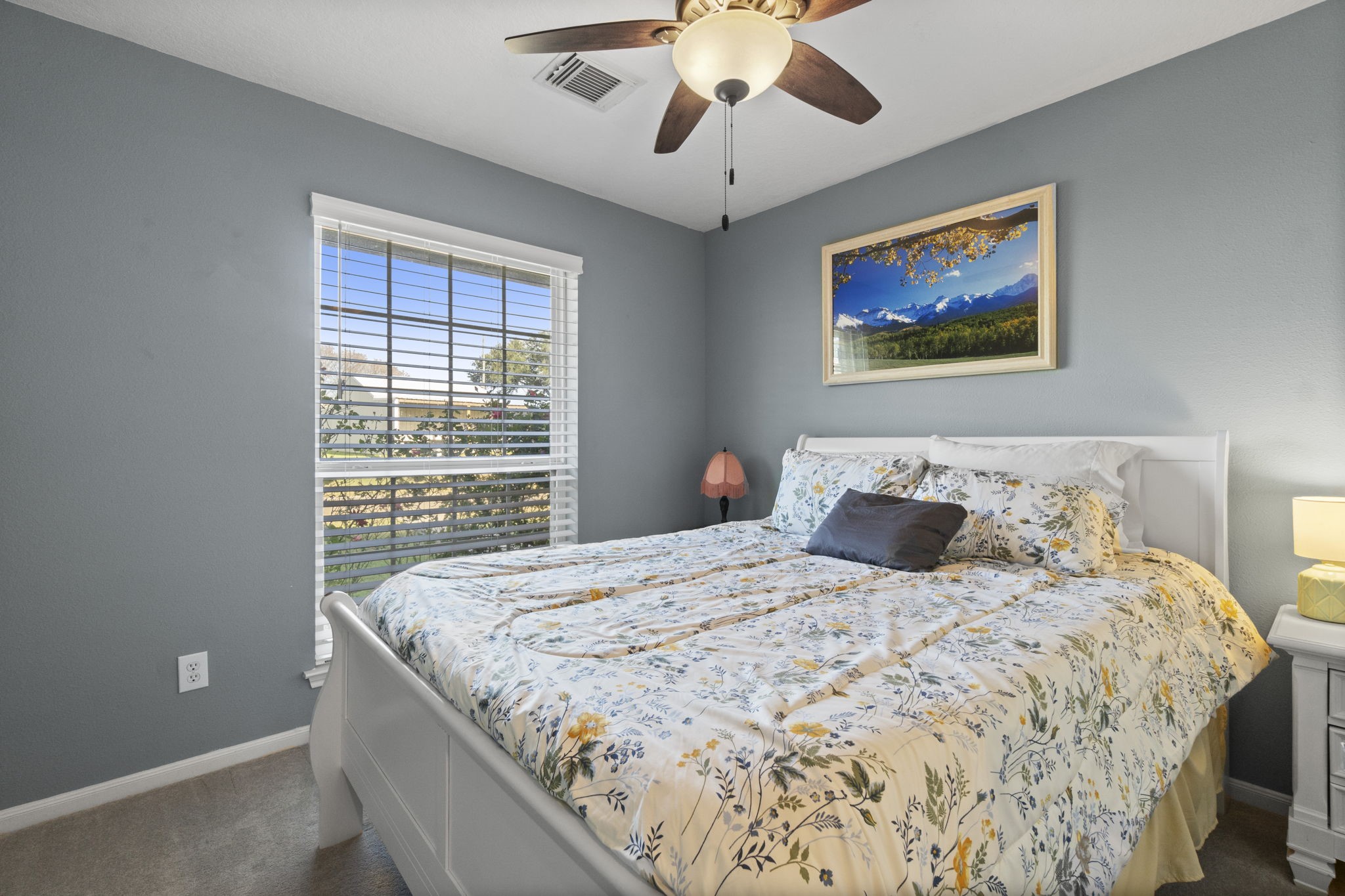 330 Crestmont Point Blank, TX 77364 - Photo 14 of 48 a bedroom with a large bed and a window