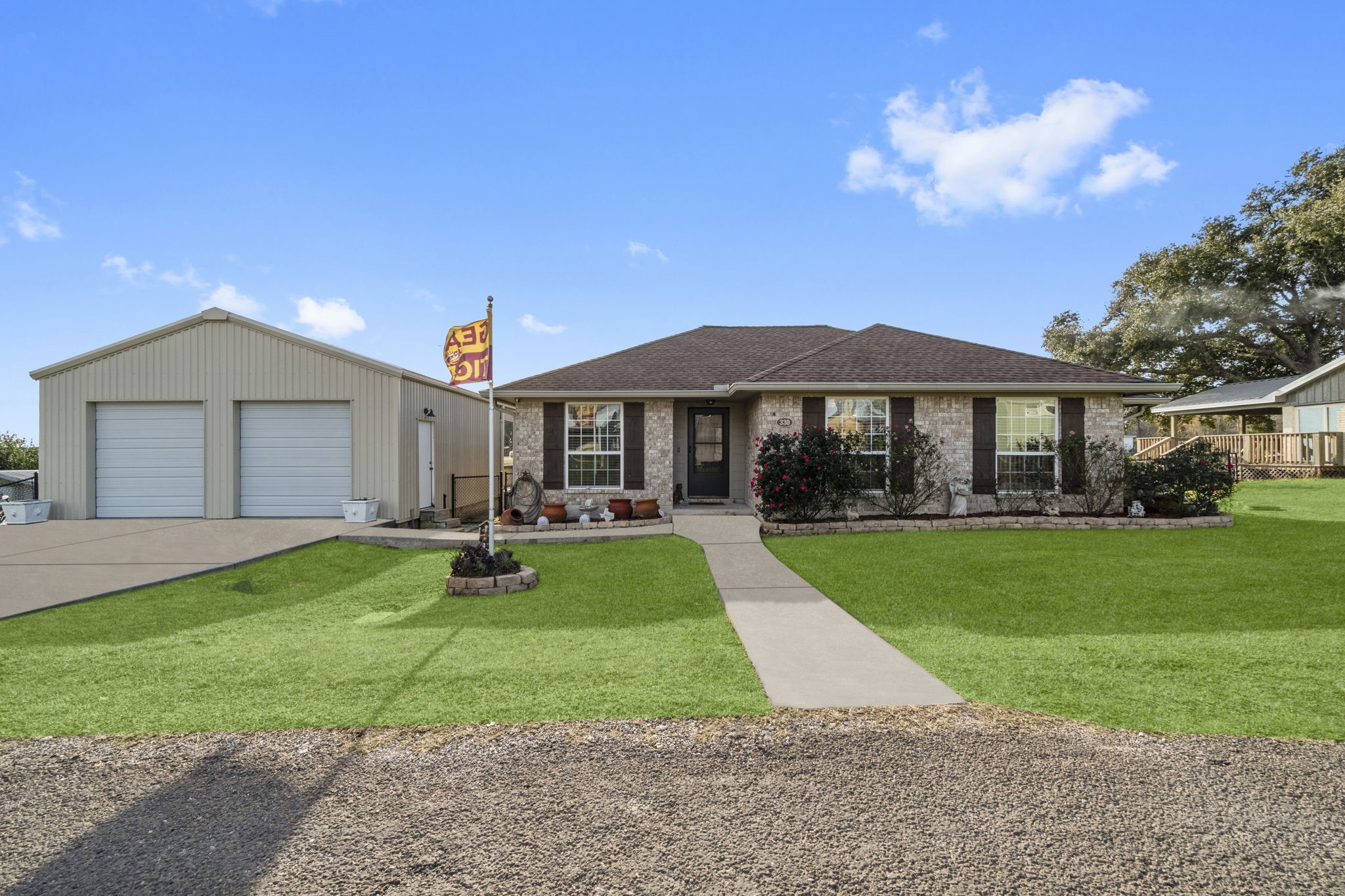 330 Crestmont Point Blank, TX 77364 - Photo 2 of 48 a front view of a house with yard and green space