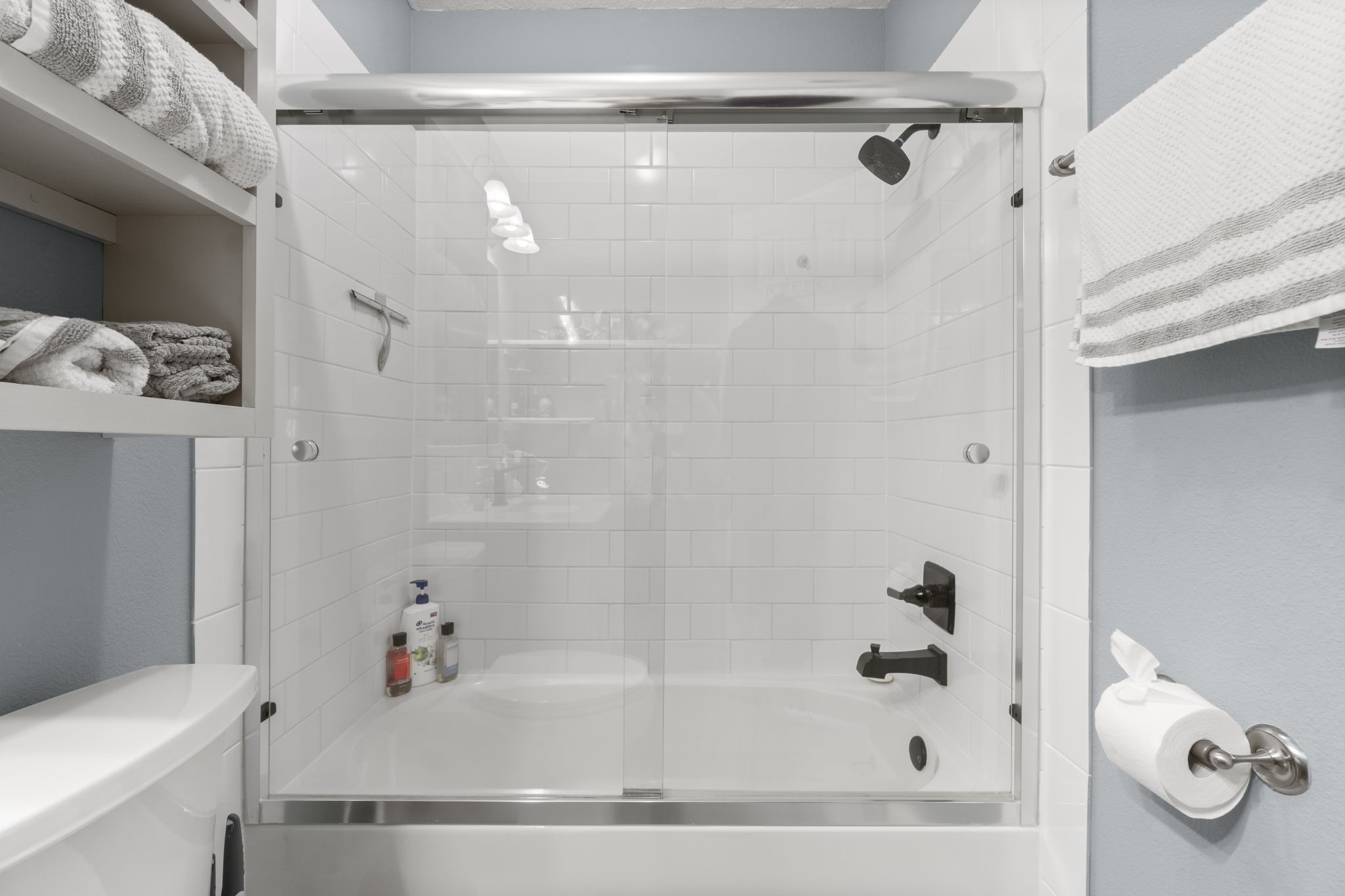 330 Crestmont Point Blank, TX 77364 - Photo 21 of 48 a bathroom with a bathtub and a shower