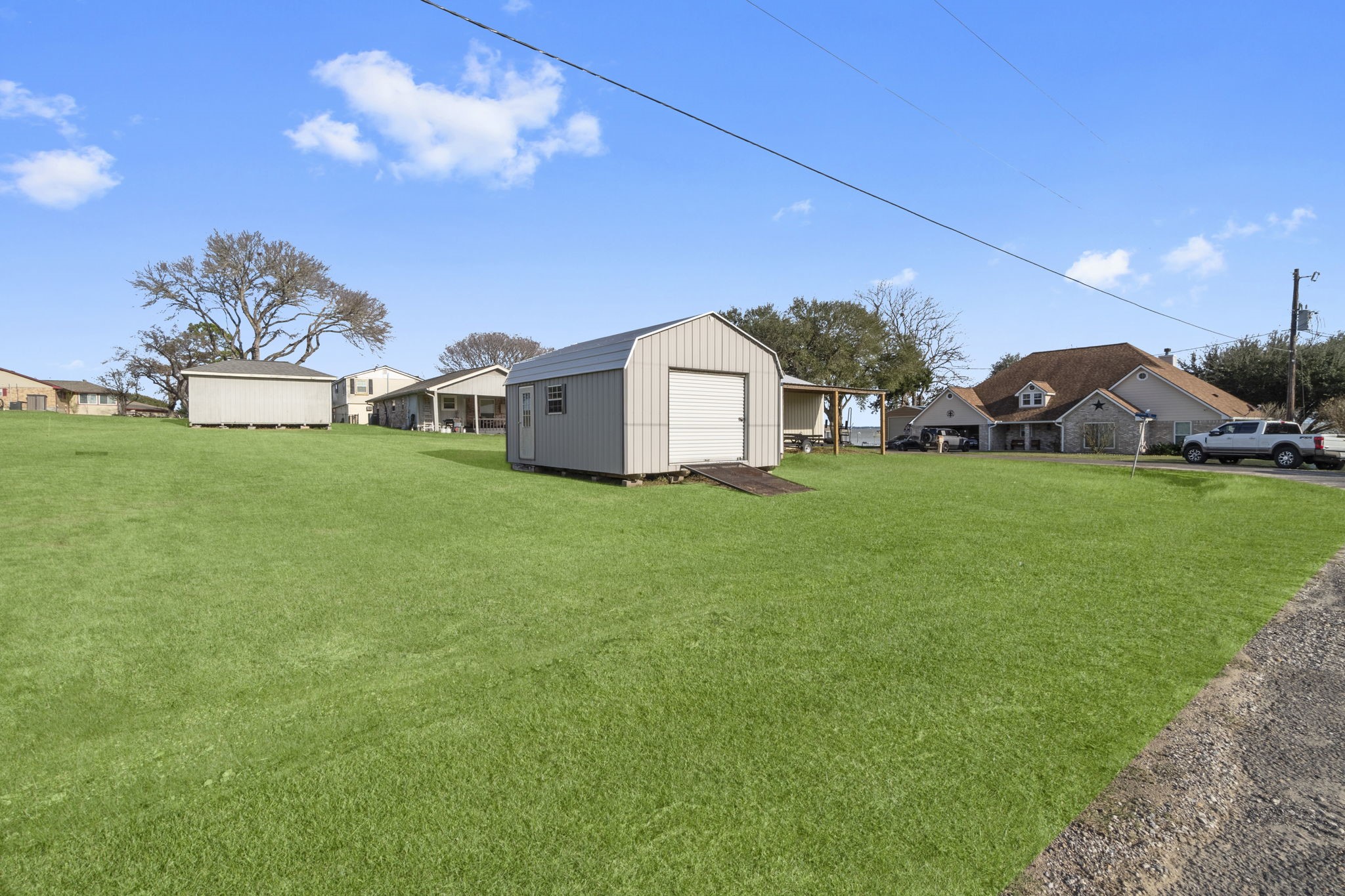 330 Crestmont Point Blank, TX 77364 - Photo 38 of 48 a view of a house with a big yard and large trees