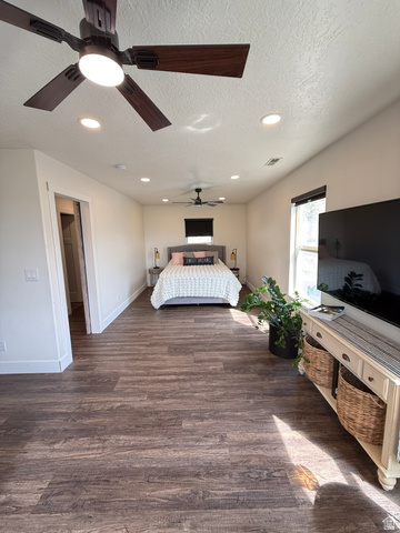 965 North 800 East Springville, UT 84663 - Photo 25 of 46 Bedroom with dark wood-type flooring, recessed lighting, a textured ceiling, and a ceiling fan