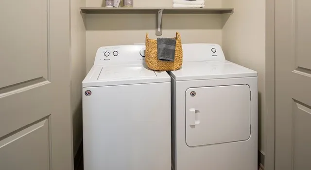 a en suite bathroom with sink and mirror