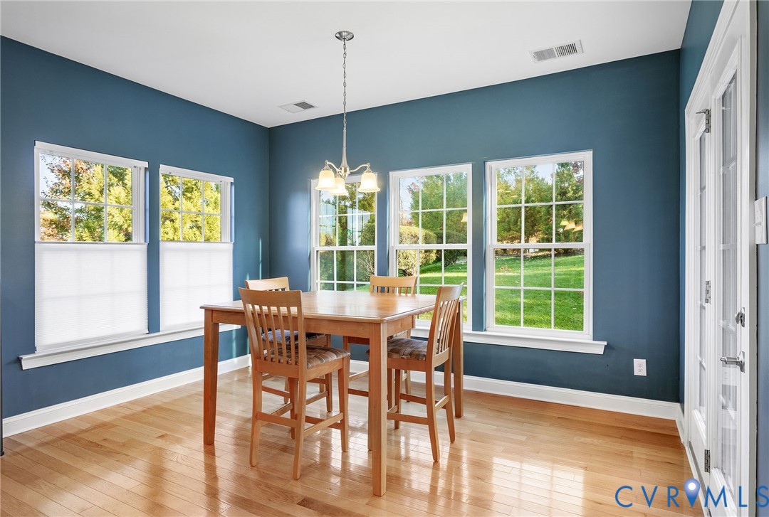 3437 Kendal Crossing Terrace Midlothian, VA 23113 - Photo 16 of 31 a view of a dining room with furniture window and outside view