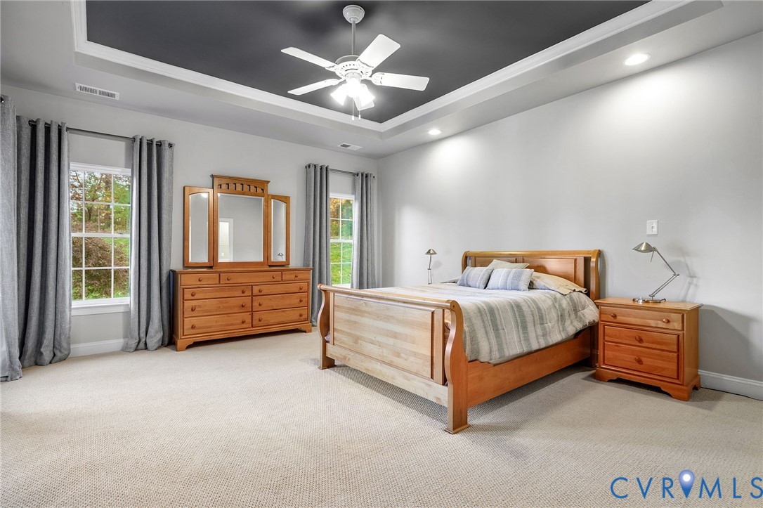 3437 Kendal Crossing Terrace Midlothian, VA 23113 - Photo 19 of 31 a spacious bedroom with a bed dresser and a window
