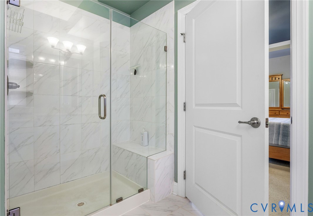 3437 Kendal Crossing Terrace Midlothian, VA 23113 - Photo 22 of 31 a bathroom with a glass shower door