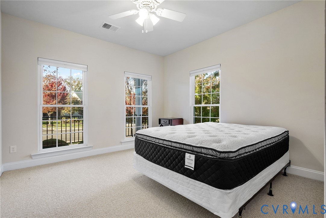 3437 Kendal Crossing Terrace Midlothian, VA 23113 - Photo 23 of 31 a bed sitting in a spacious bedroom next to a window