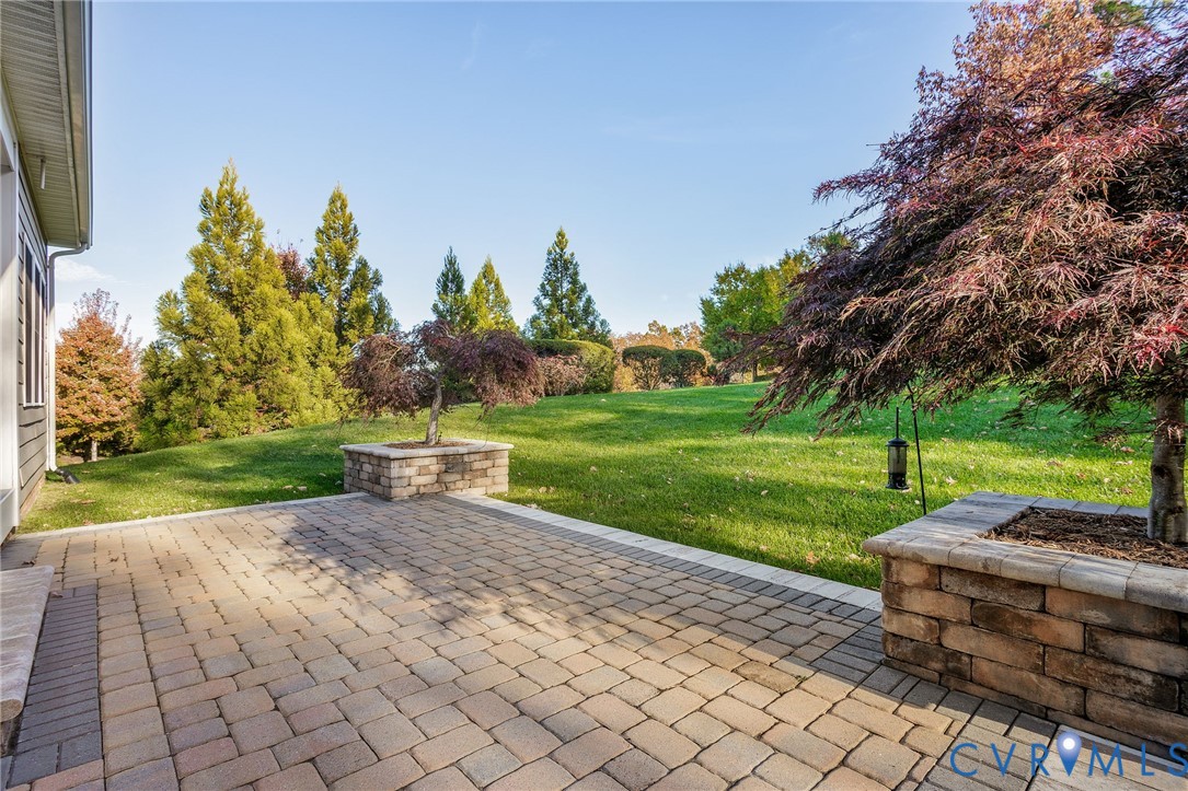 3437 Kendal Crossing Terrace Midlothian, VA 23113 - Photo 27 of 31 a view of a backyard with sitting area