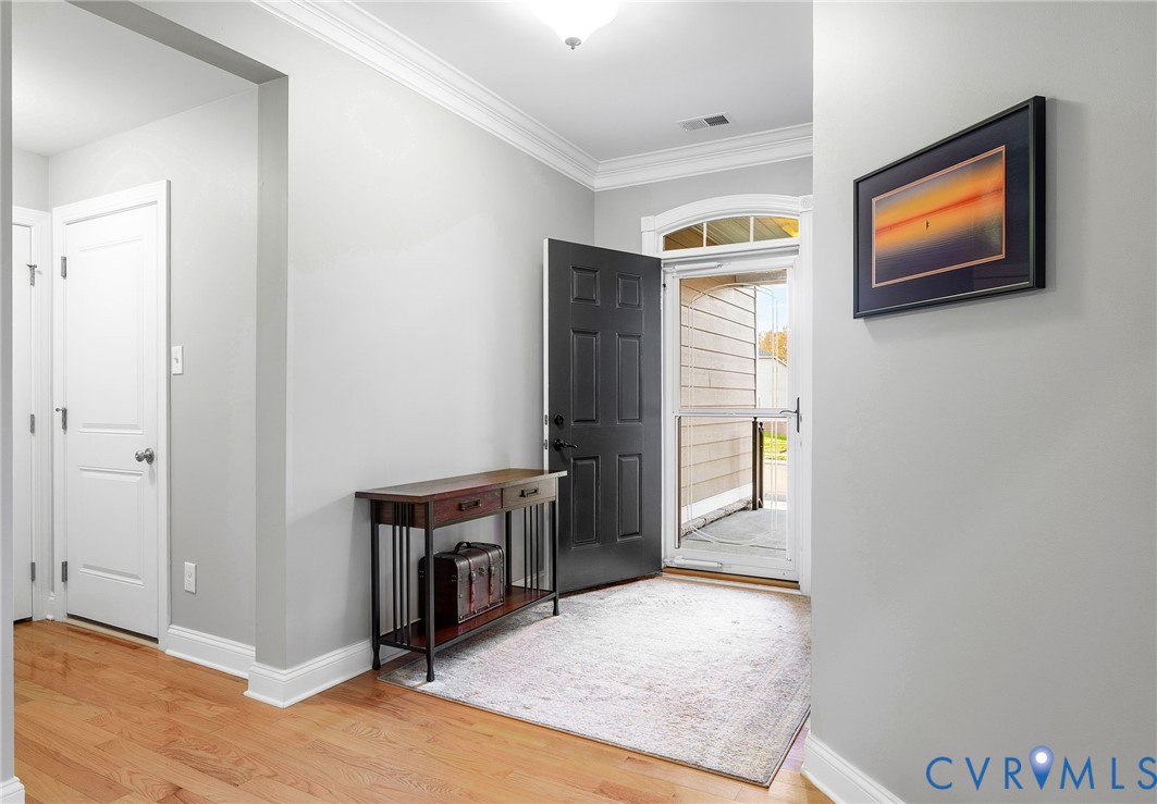 3437 Kendal Crossing Terrace Midlothian, VA 23113 - Photo 6 of 31 a view of an empty room with furniture and a window