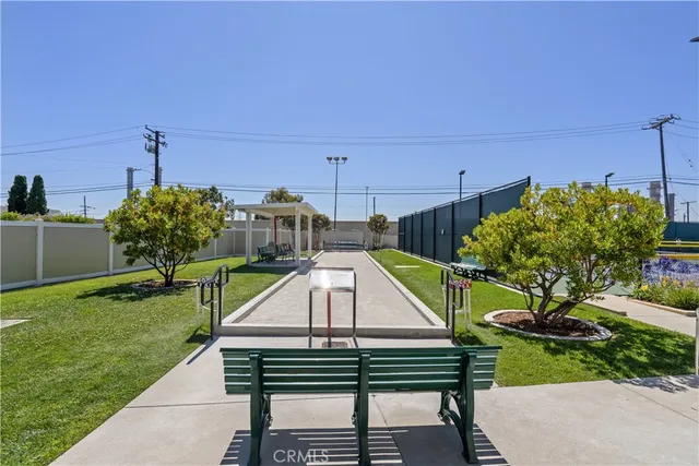 a view of a backyard with sitting area