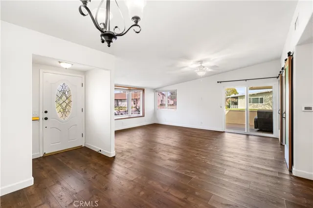 a view of a livingroom with wooden floor