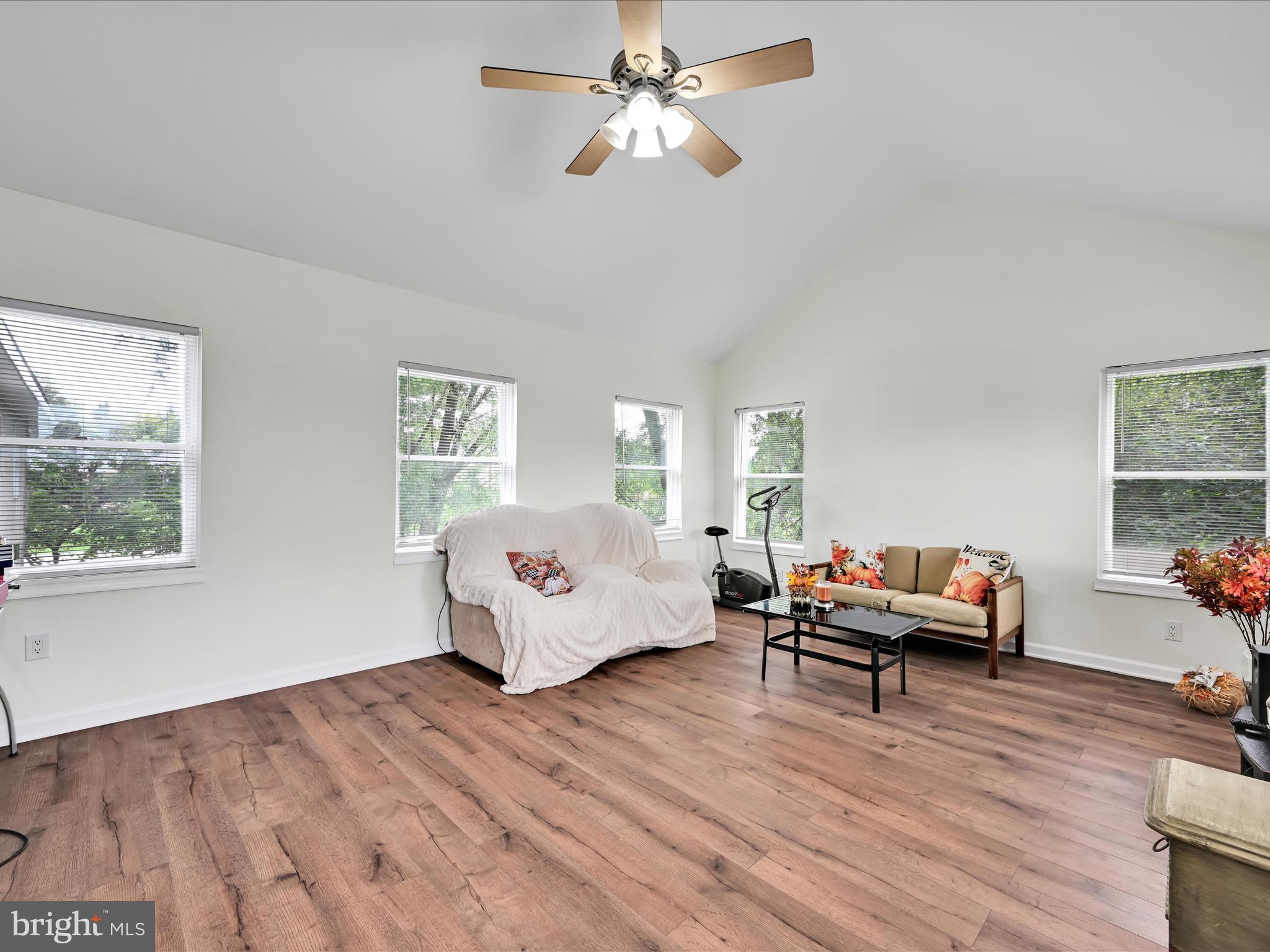 742 Power Road Manheim, PA 17545 - Photo 12 of 56 a living room with furniture and a wooden floor