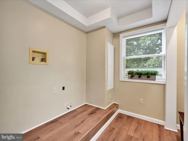 a bathroom with a sink a mirror and a shower