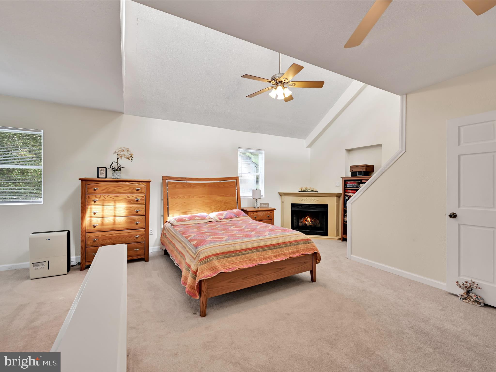 742 Power Road Manheim, PA 17545 - Photo 27 of 56 a bedroom with a bed and a fireplace