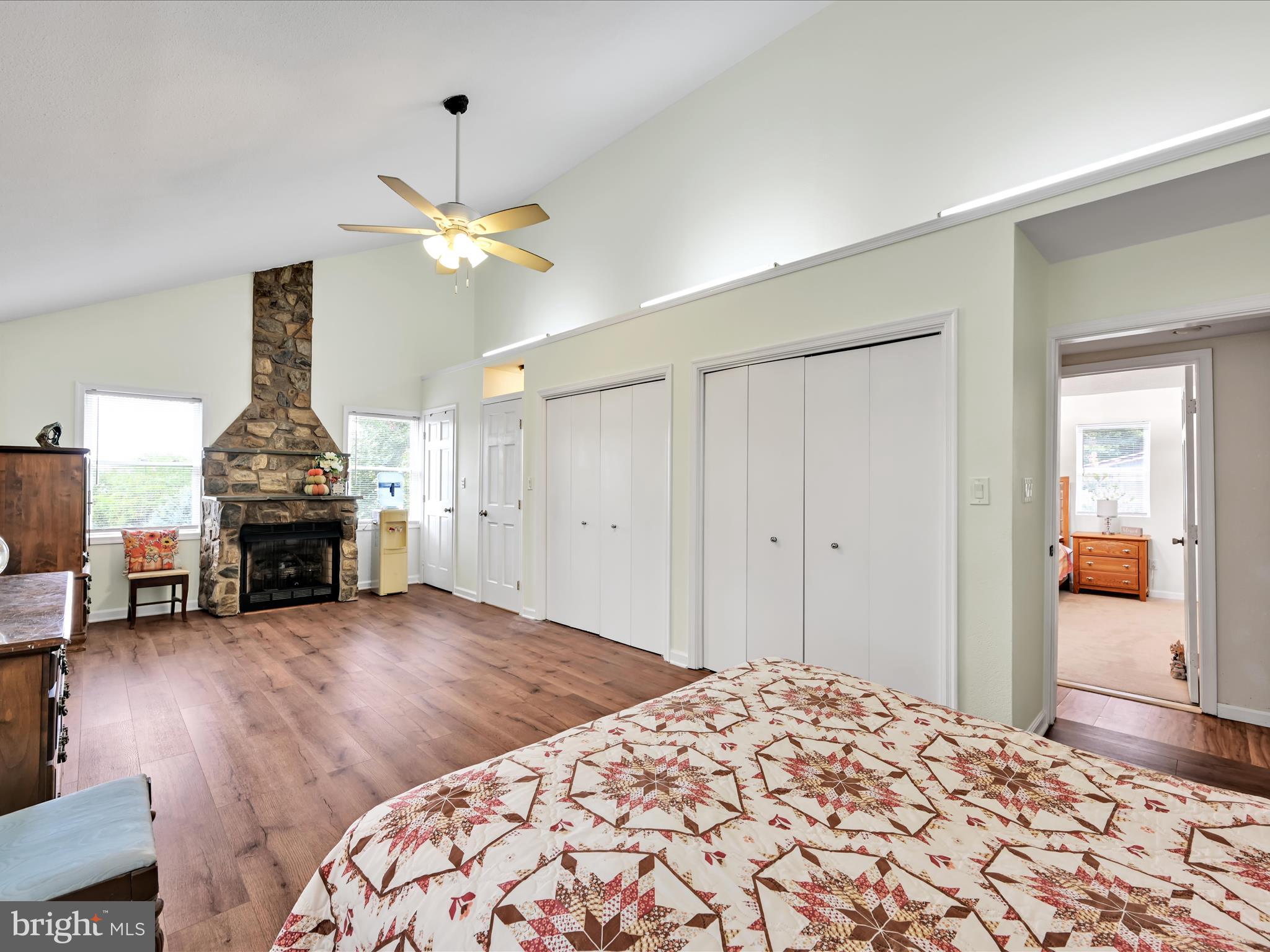 742 Power Road Manheim, PA 17545 - Photo 31 of 56 a bedroom with a bed and a chandelier