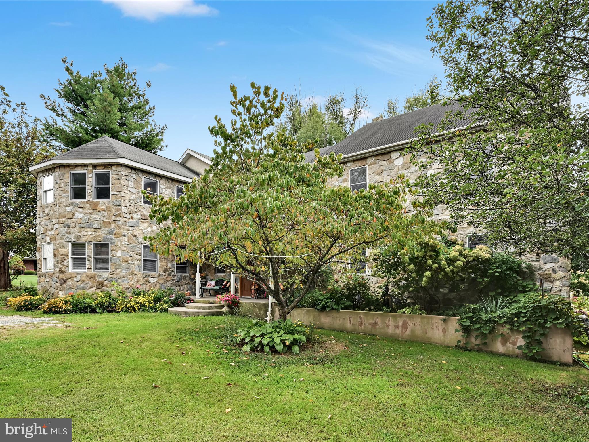 742 Power Road Manheim, PA 17545 - Photo 4 of 56 a front view of a house with a yard