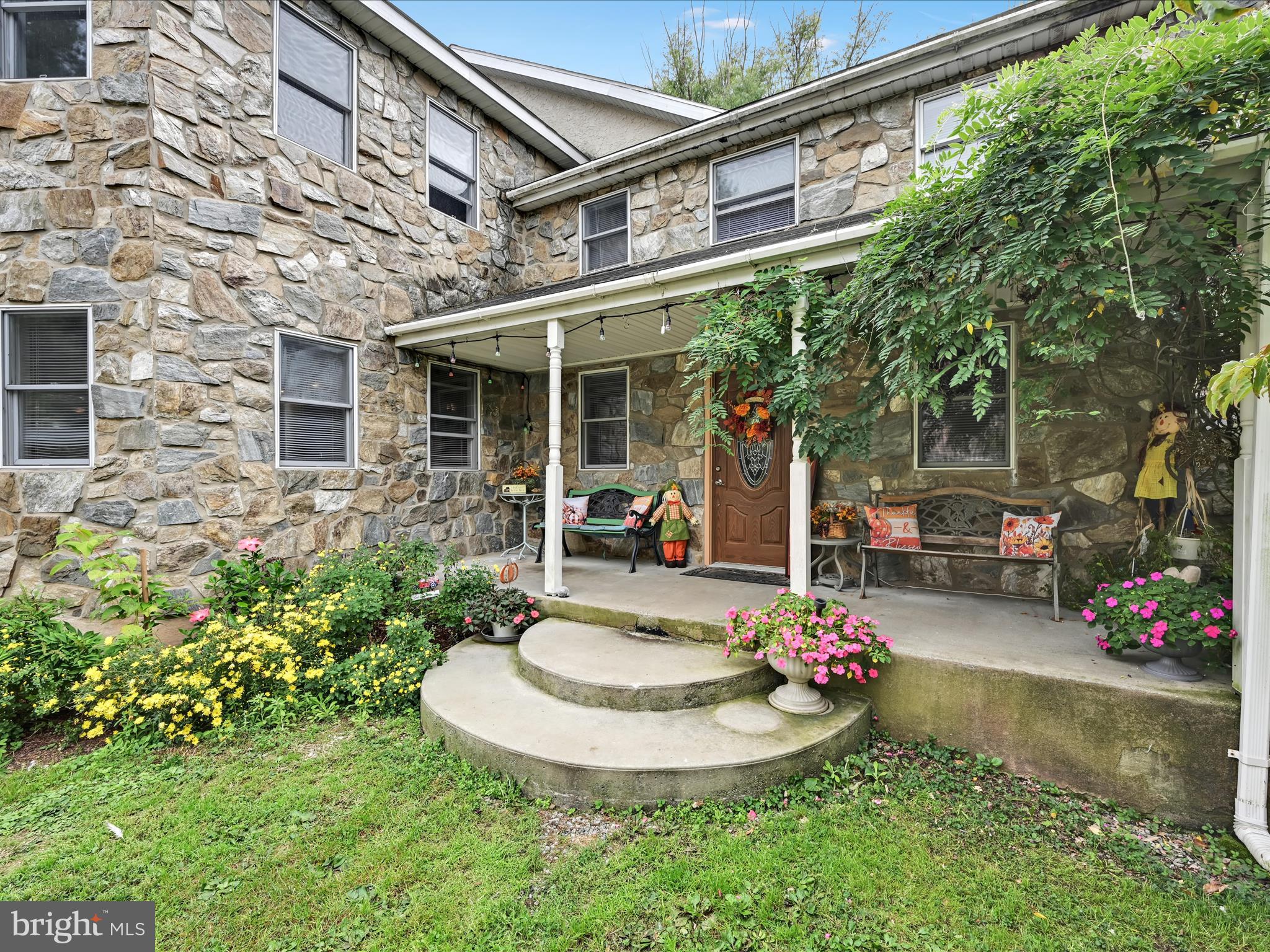 742 Power Road Manheim, PA 17545 - Photo 5 of 56 a view of a house with table and chairs in a patio
