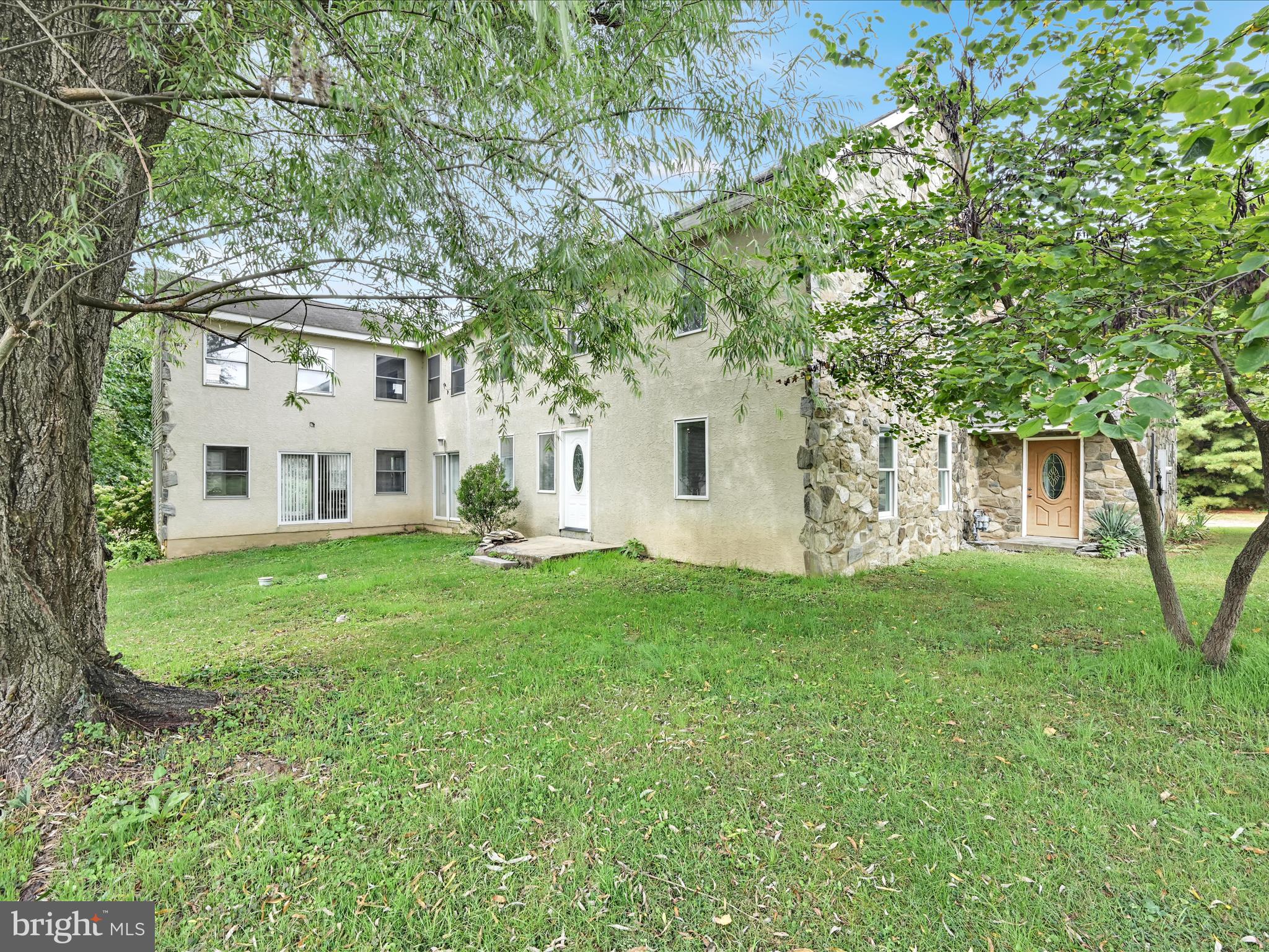 742 Power Road Manheim, PA 17545 - Photo 51 of 56 a view of a white house with a big yard and large tree