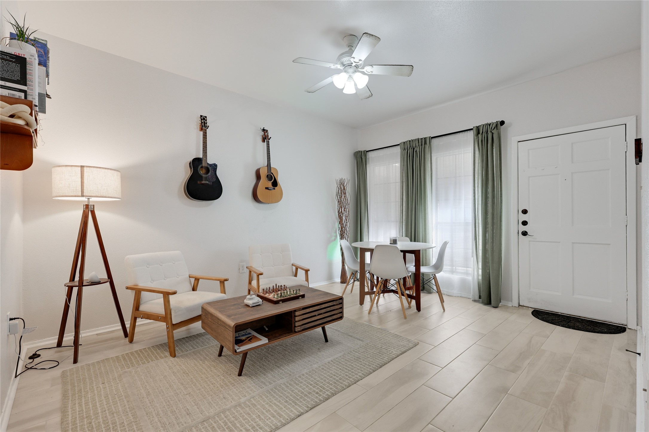 a living room with furniture and a window