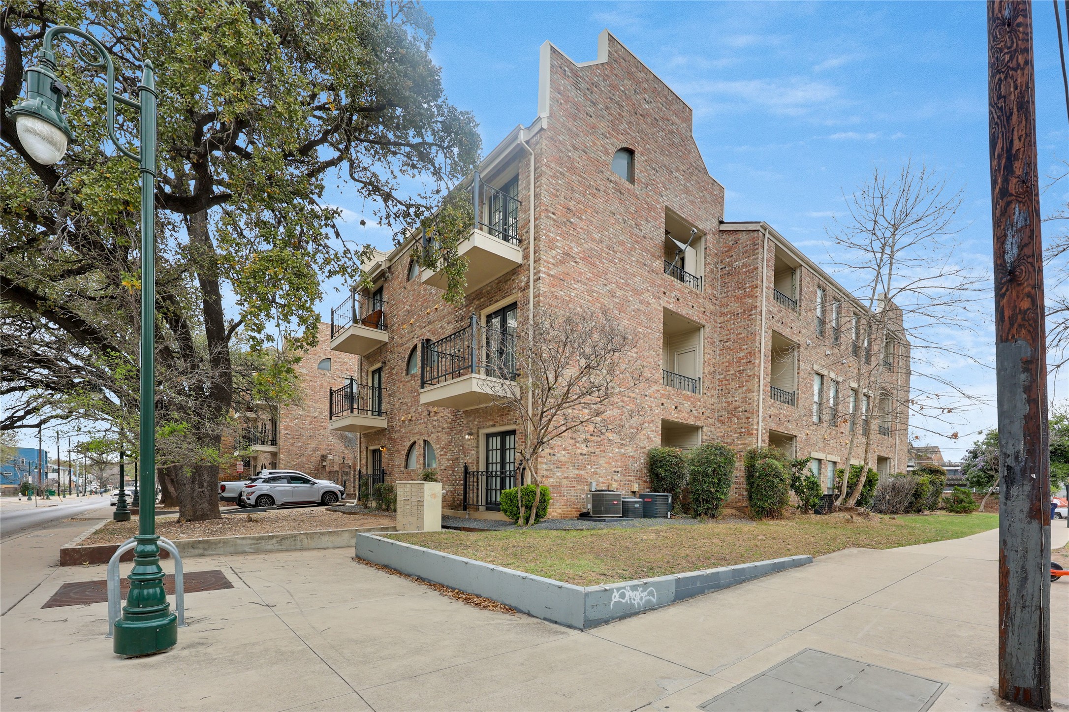 2801 Rio Grande Street, Unit 103 Austin, TX 78705 - Photo 11 of 15 a view of a building with a street