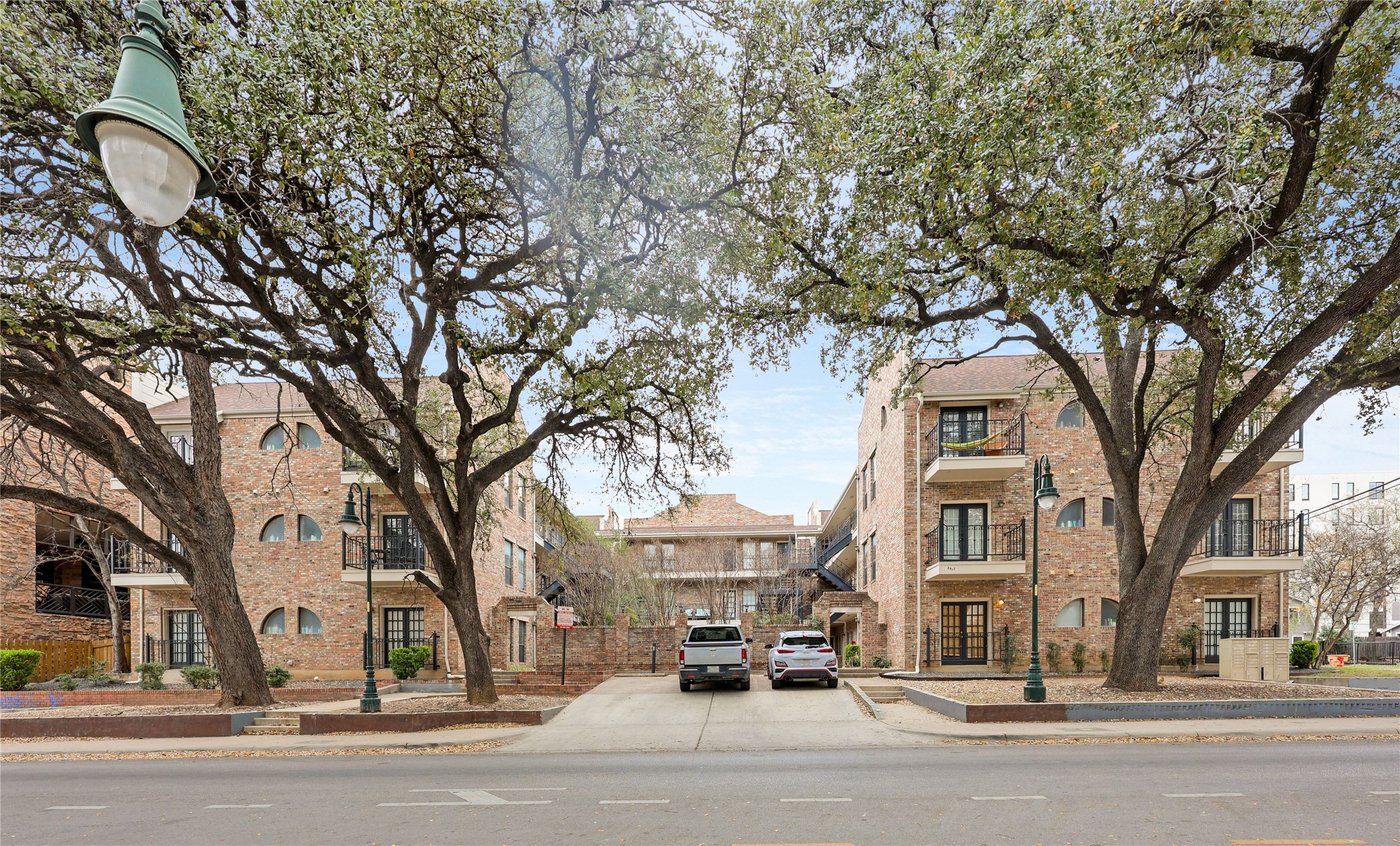 2801 Rio Grande Street, Unit 103 Austin, TX 78705 - Photo 12 of 15 a view of city street with a house