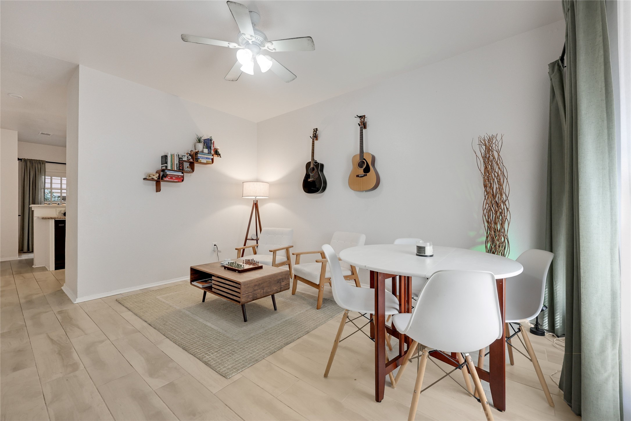 2801 Rio Grande Street, Unit 103 Austin, TX 78705 - Photo 2 of 15 a view of a workspace with furniture and wooden floor