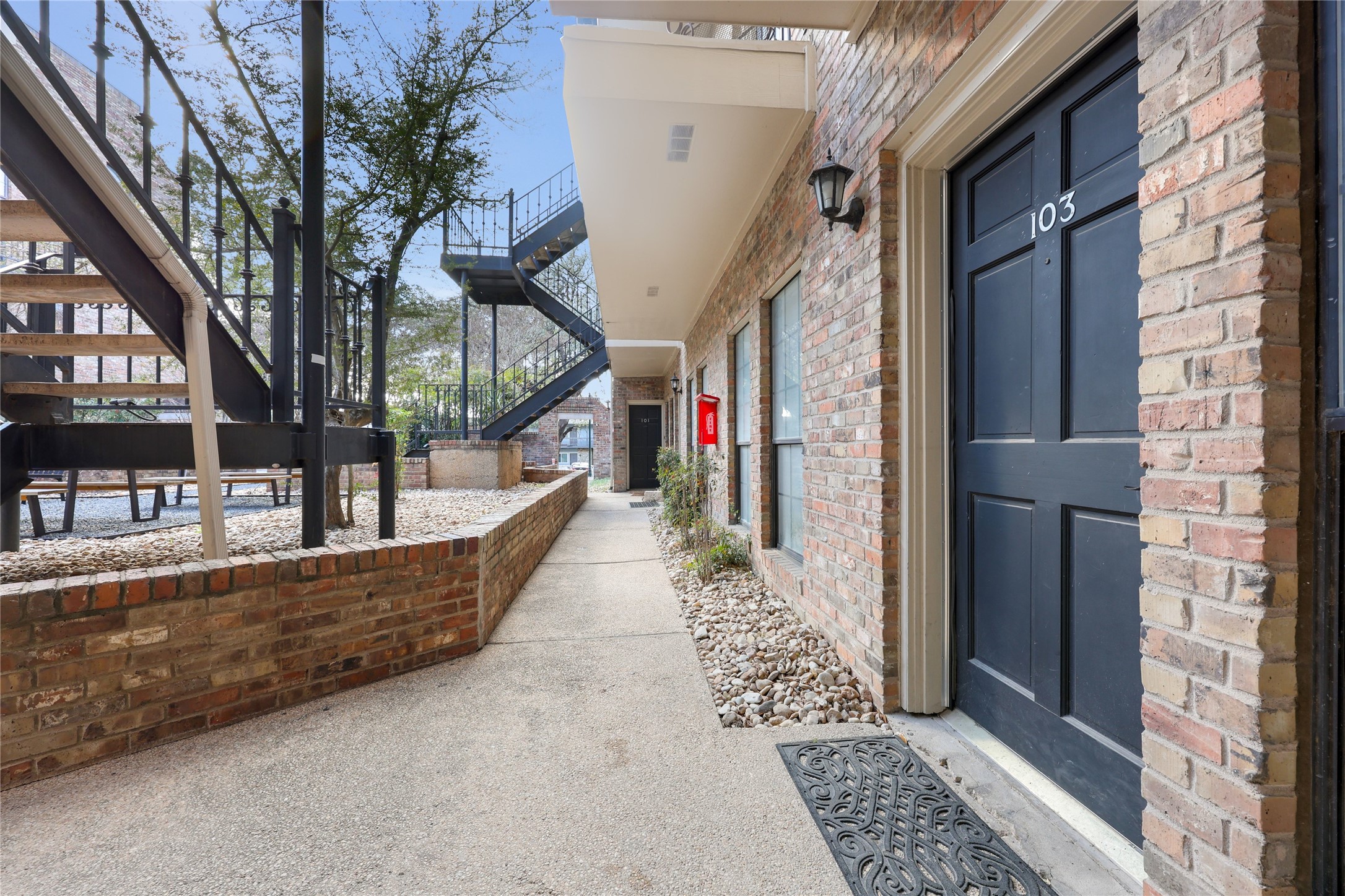 2801 Rio Grande Street, Unit 103 Austin, TX 78705 - Photo 10 of 15 a view of a house with a large windows