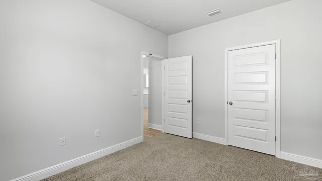 an empty room with closet