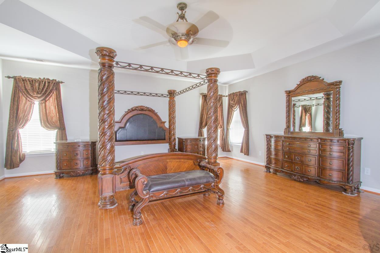 105 Selden Way Fountain Inn, SC 29644 - Photo 20 of 31 Huge 20 x 21 master bedroom with gorgeous hardwood floors, trey ceiling and lots of windows.