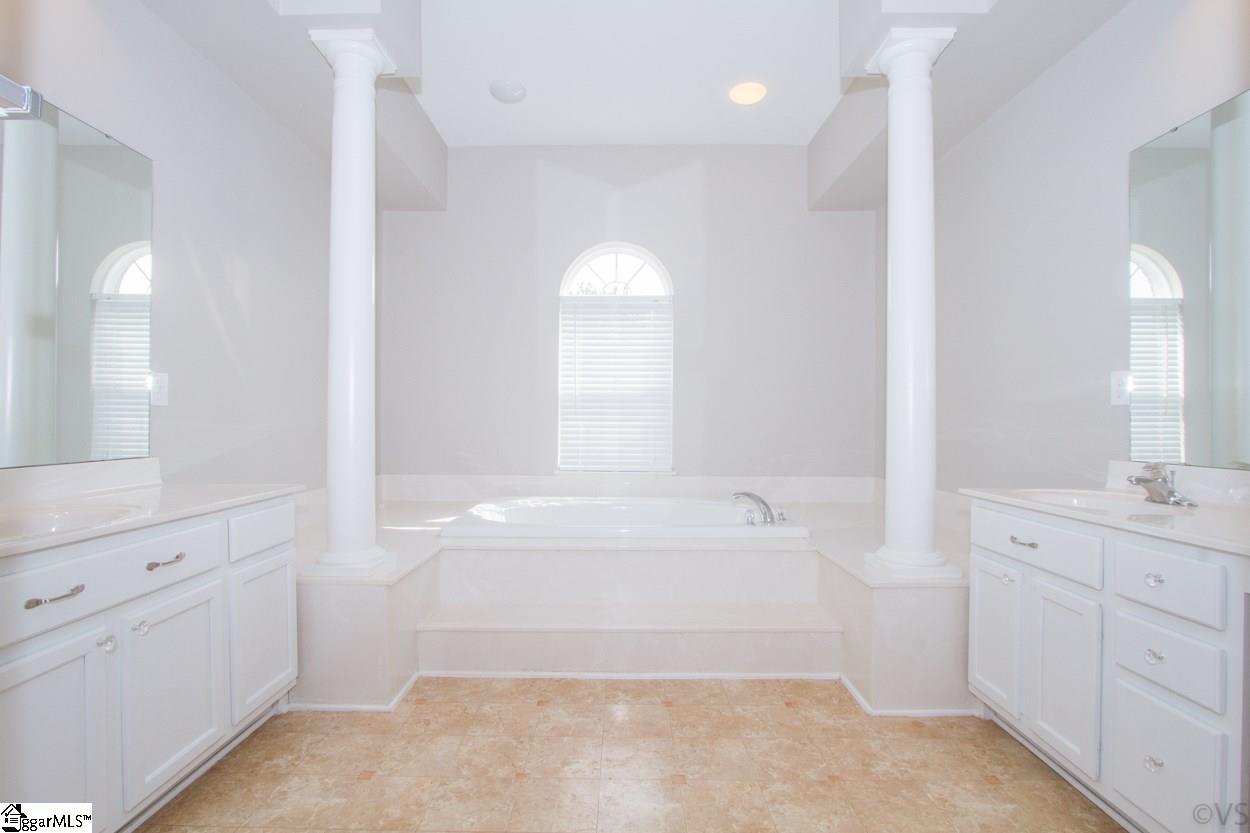 105 Selden Way Fountain Inn, SC 29644 - Photo 21 of 31 Huge master bathroom! How would you like to relax in this spa-like environment after a long day at work? His/Hers sinks and step up soaking tub.
