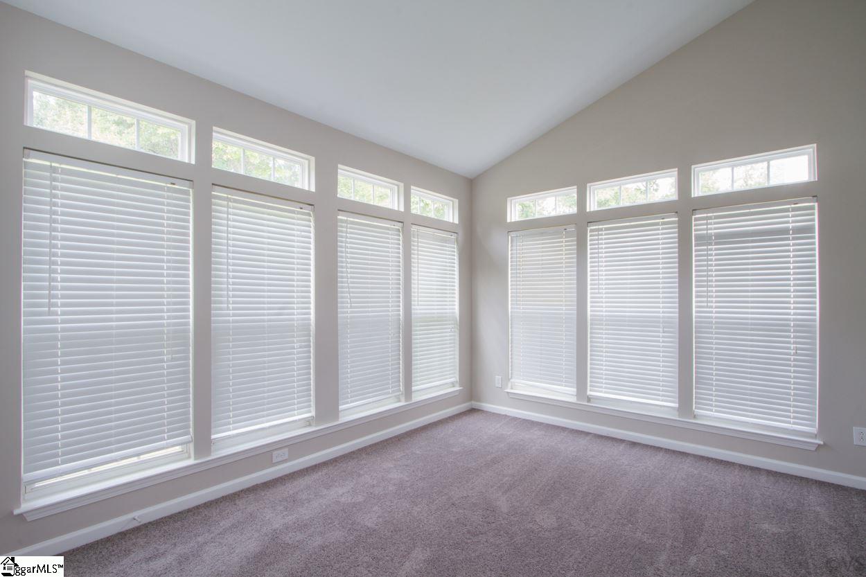 105 Selden Way Fountain Inn, SC 29644 - Photo 8 of 31 Bright sunroom with vaulted ceilings, new paint and carpet. You will love hanging out and relaxing in this space, anytime of the day or night.