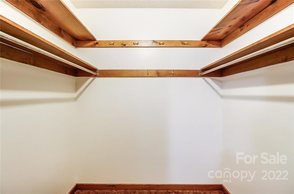 5618 Davis Road Waxhaw, NC 28173 - Photo 18 of 41 a view of small space with racks on the wall