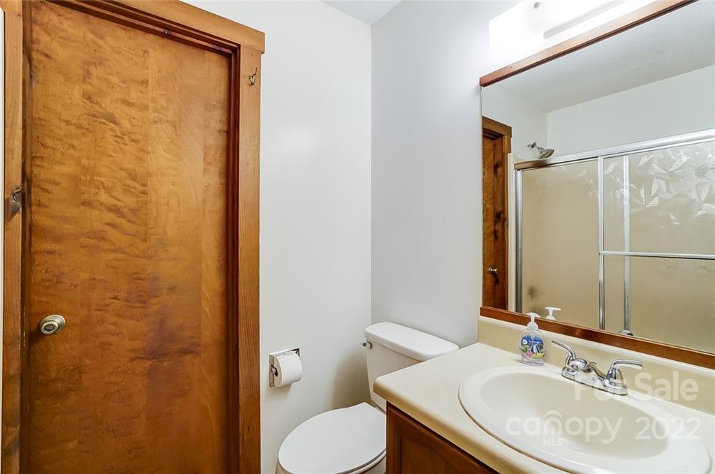 5618 Davis Road Waxhaw, NC 28173 - Photo 19 of 41 a bathroom with a sink and a mirror