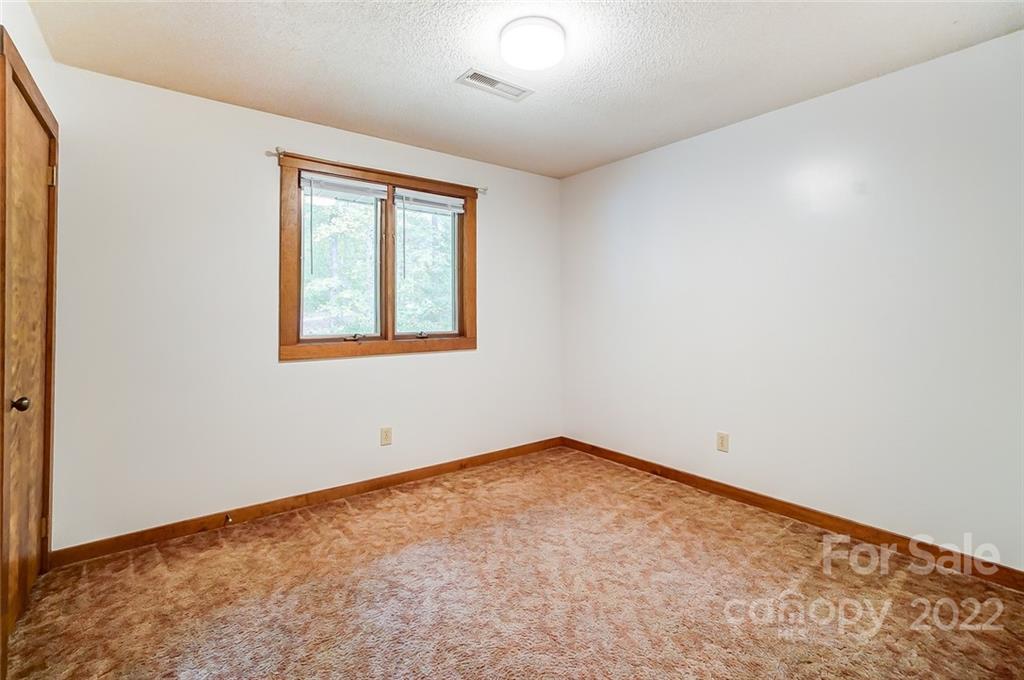5618 Davis Road Waxhaw, NC 28173 - Photo 21 of 41 an empty room with a window