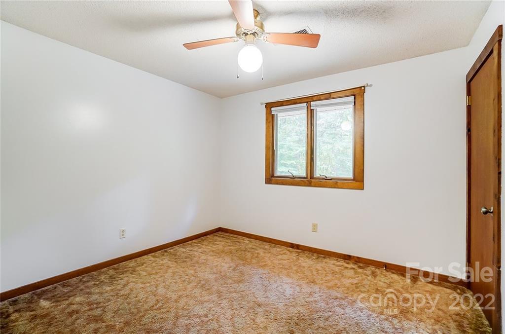5618 Davis Road Waxhaw, NC 28173 - Photo 24 of 41 a view of an empty room with a window