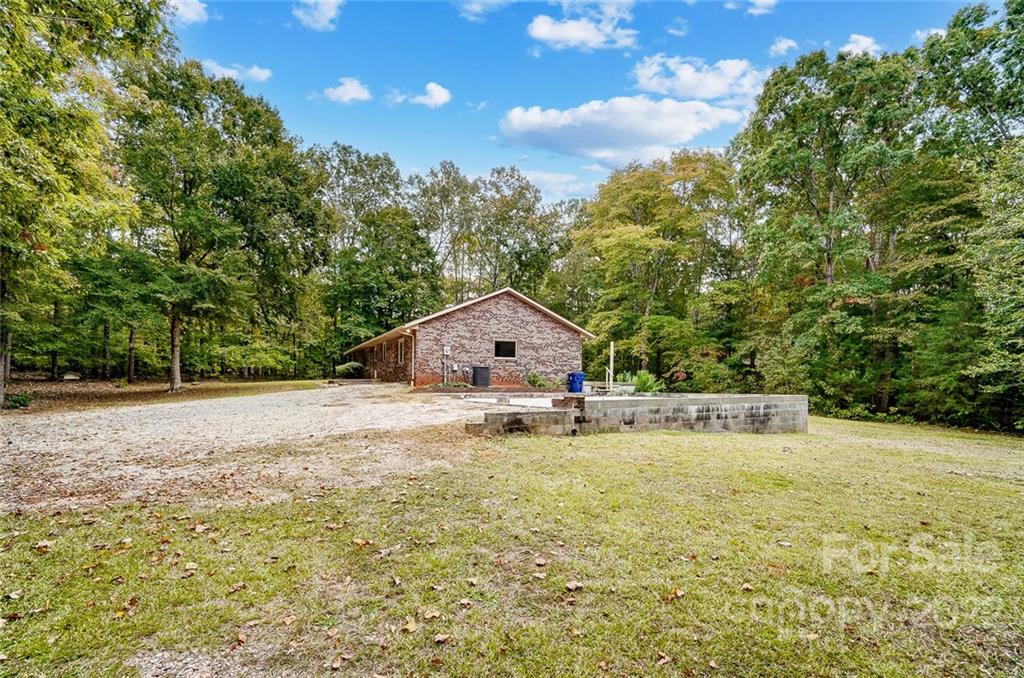 5618 Davis Road Waxhaw, NC 28173 - Photo 30 of 41 a house with trees in the background