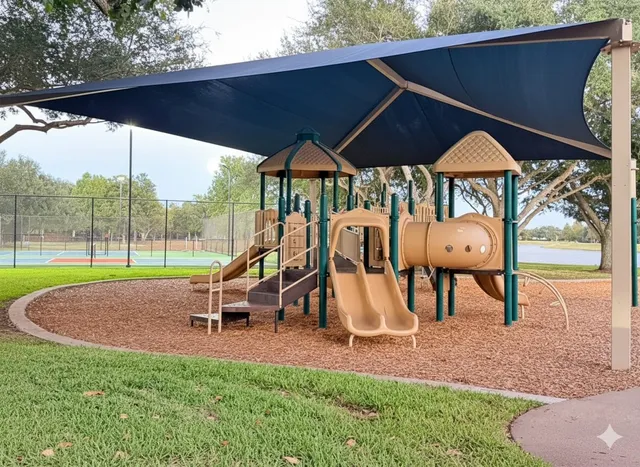 a view of a swimming pool with a deck