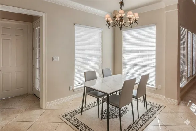 a kitchen with stainless steel appliances granite countertop a stove oven and a refrigerator