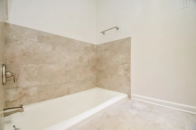 a bathroom with a bathtub