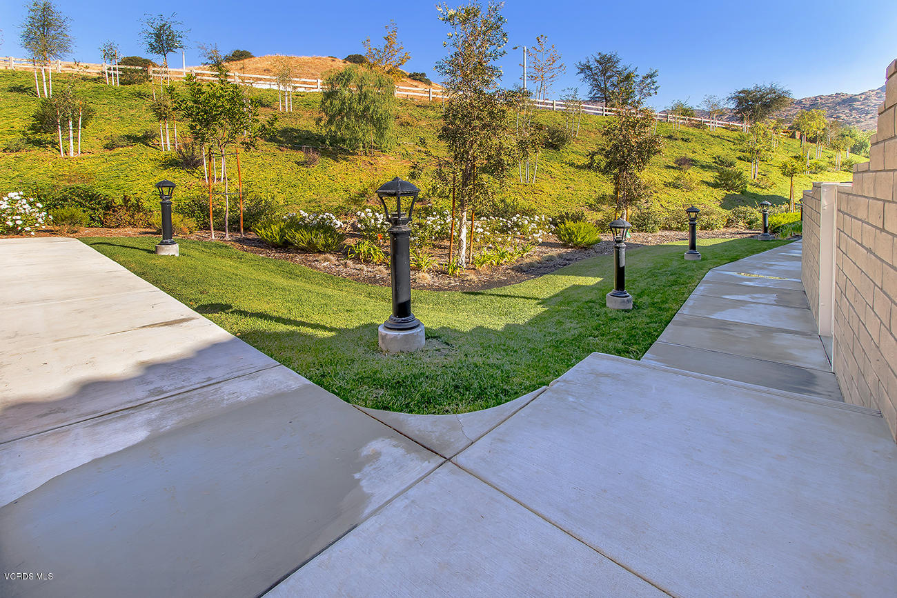 2464 Blossom Ridge Court, Unit 2 Simi Valley, CA 93063 - Photo 21 of 41 a view of a park with houses