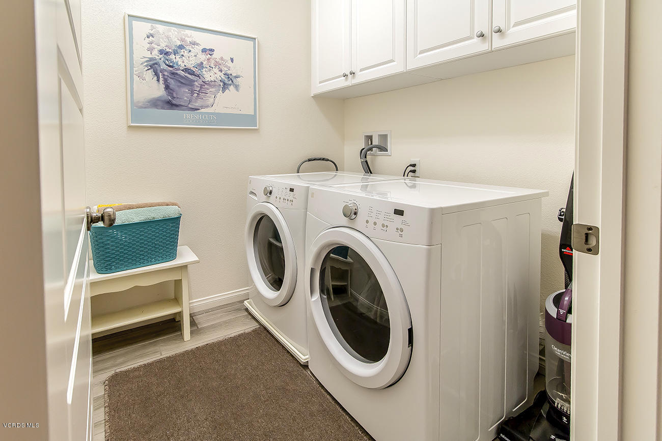 2464 Blossom Ridge Court, Unit 2 Simi Valley, CA 93063 - Photo 33 of 41 a utility room with dryer and washer