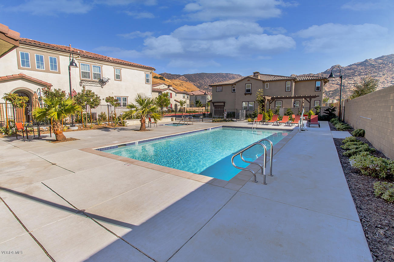 2464 Blossom Ridge Court, Unit 2 Simi Valley, CA 93063 - Photo 38 of 41 an outdoor space with swimming pool and furniture