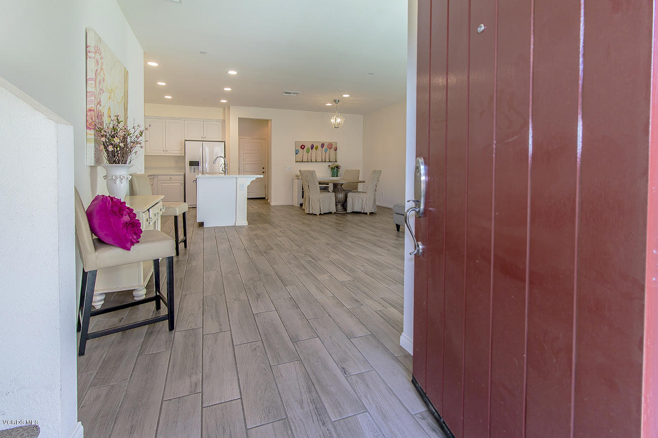 2464 Blossom Ridge Court, Unit 2 Simi Valley, CA 93063 - Photo 6 of 41 a living room with furniture and a wooden floor