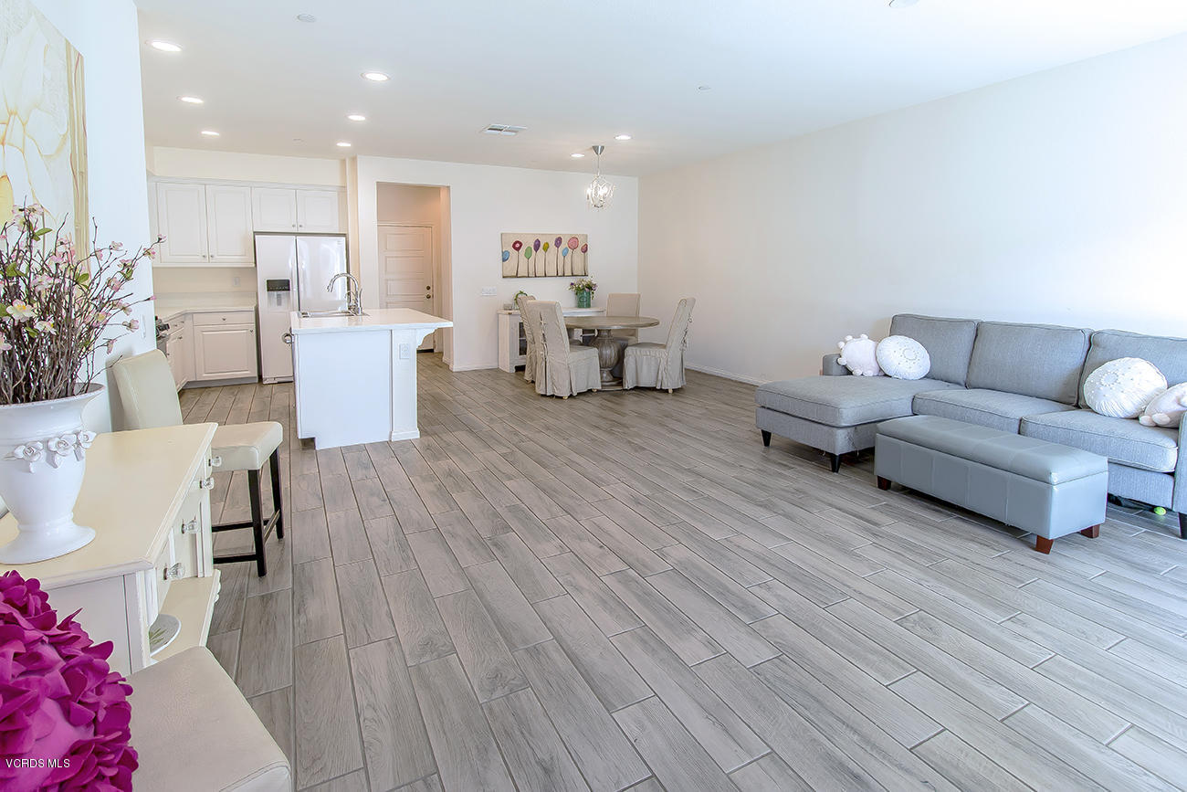 2464 Blossom Ridge Court, Unit 2 Simi Valley, CA 93063 - Photo 7 of 41 a living room with furniture and wooden floor