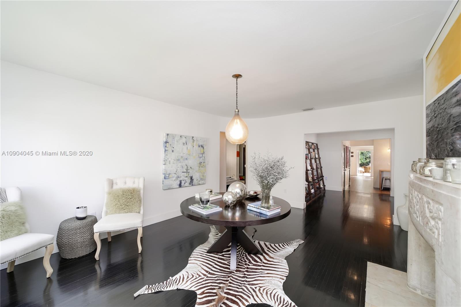 434 Southwest 30th Road Miami, FL 33129 - Photo 22 of 51 a living room with furniture and a table