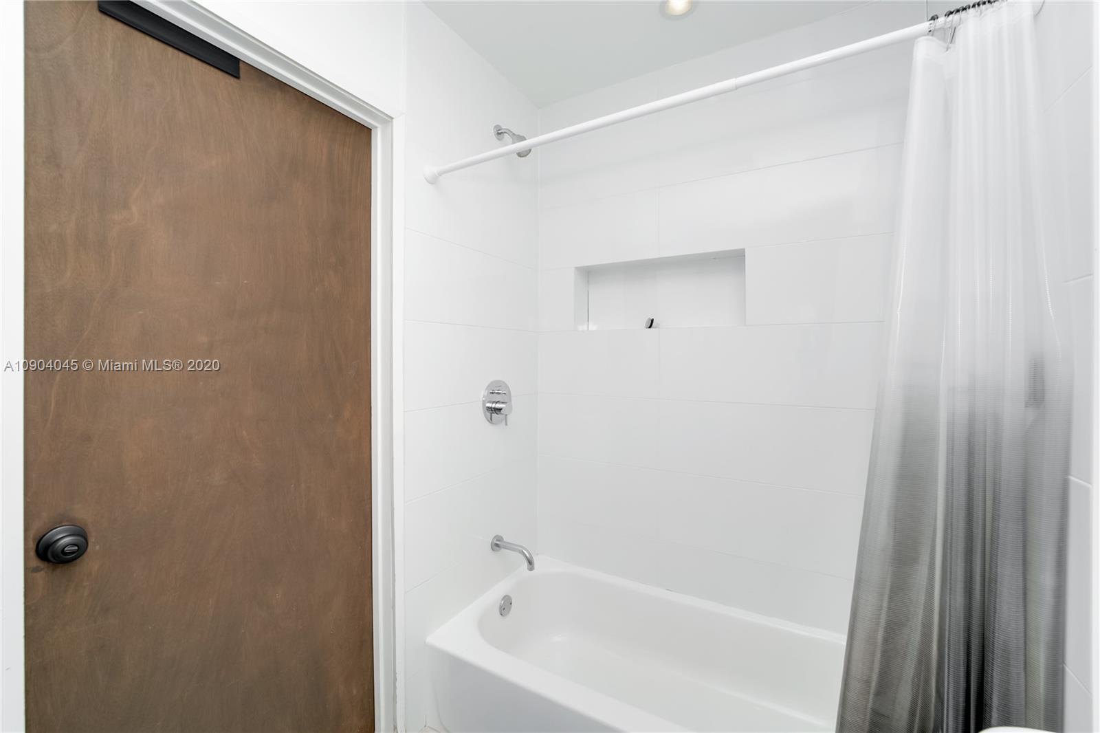 434 Southwest 30th Road Miami, FL 33129 - Photo 39 of 51 a bathroom with a bathtub
